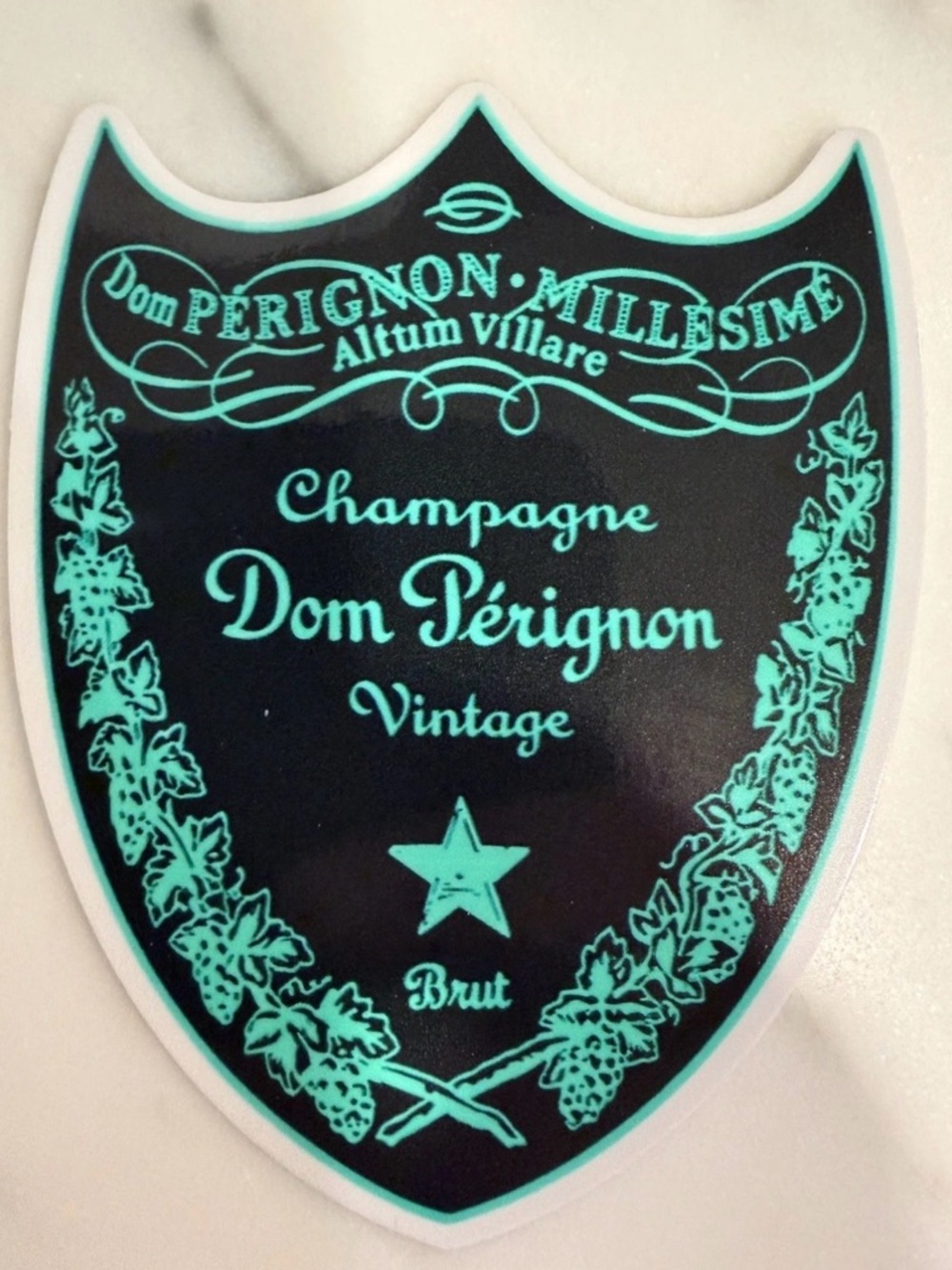 Champagne Dom Pérignon Sticker — Black & Teal Accents